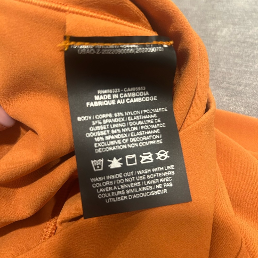 Nike Zenvy Dri-FIT Orange Apparel - Picture 6 of 6